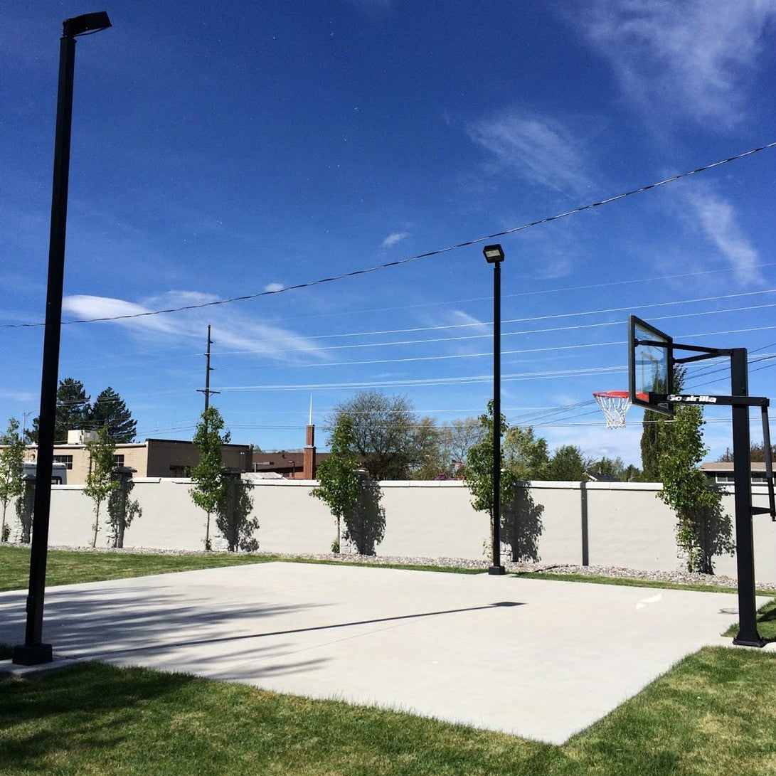 Light pole for basketball shop court